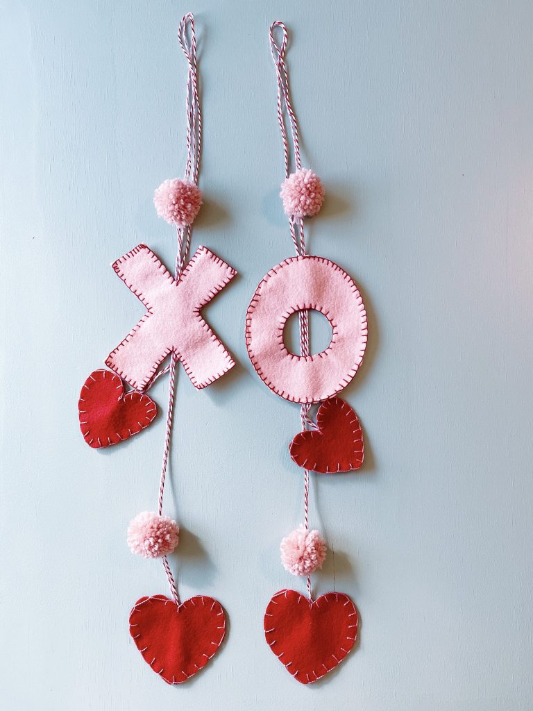 X O felt cabinet hangers